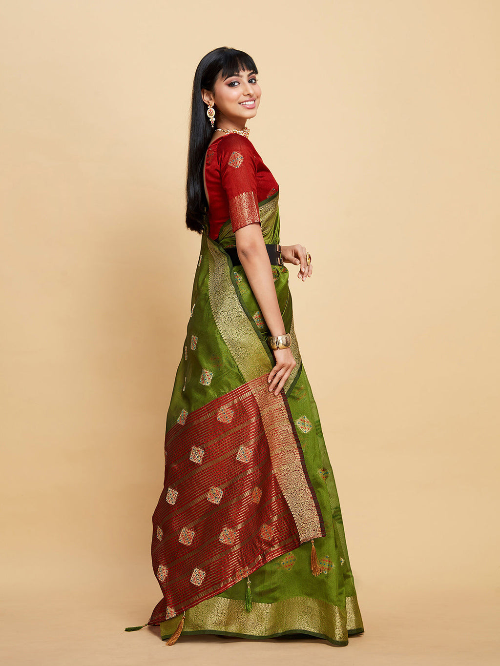 Sangria Green Ethnic Motifs Woven Design Zari Organza Saree | Grocsy