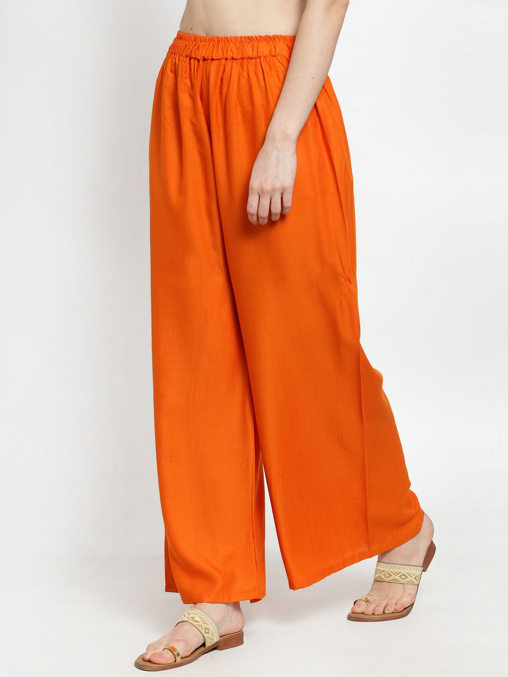 TAG 7 Women Orange Solid Wide Leg Palazzos | Grocsy