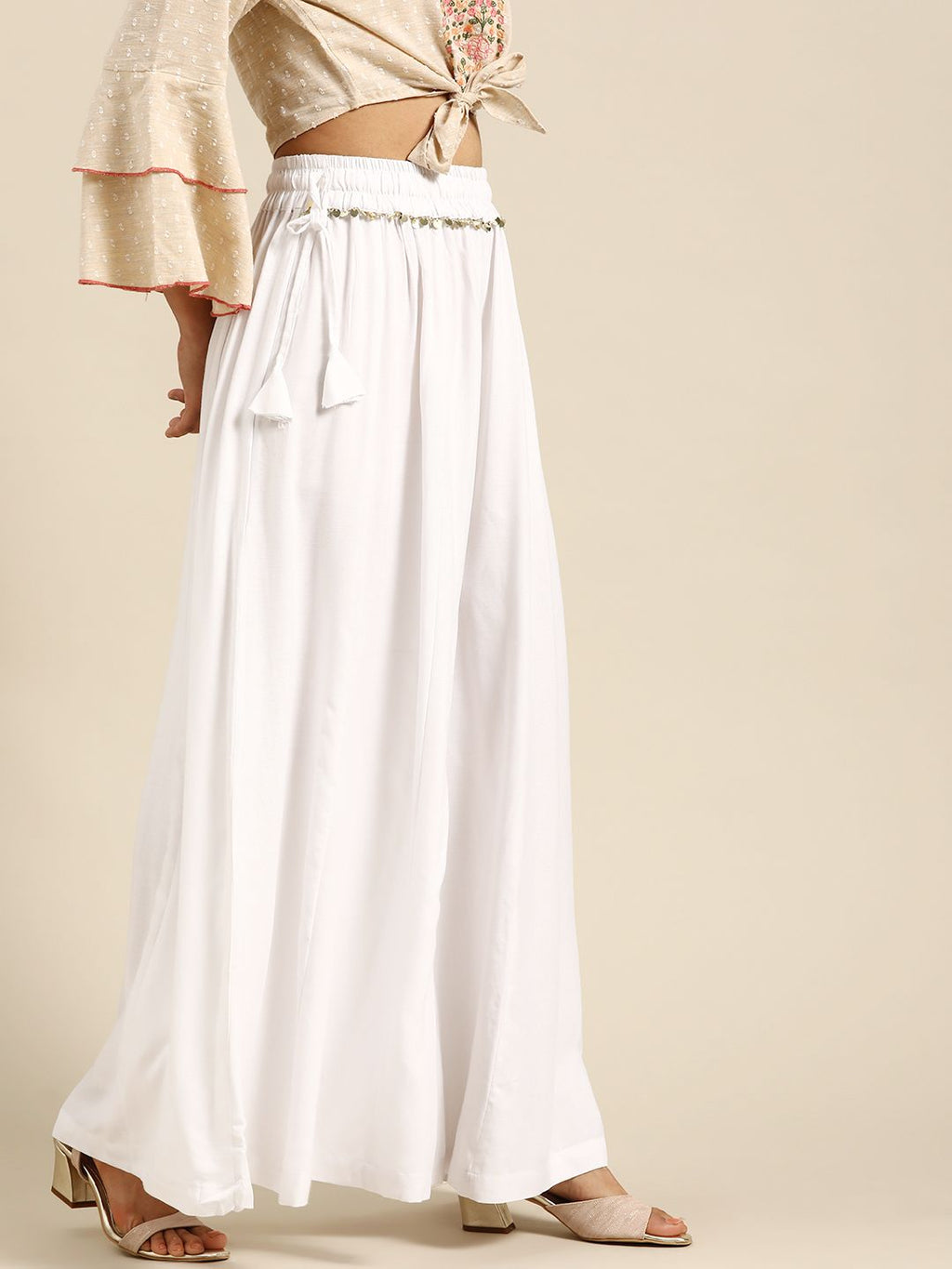 TAG 7 Women White Solid Flared Palazzos | Grocsy