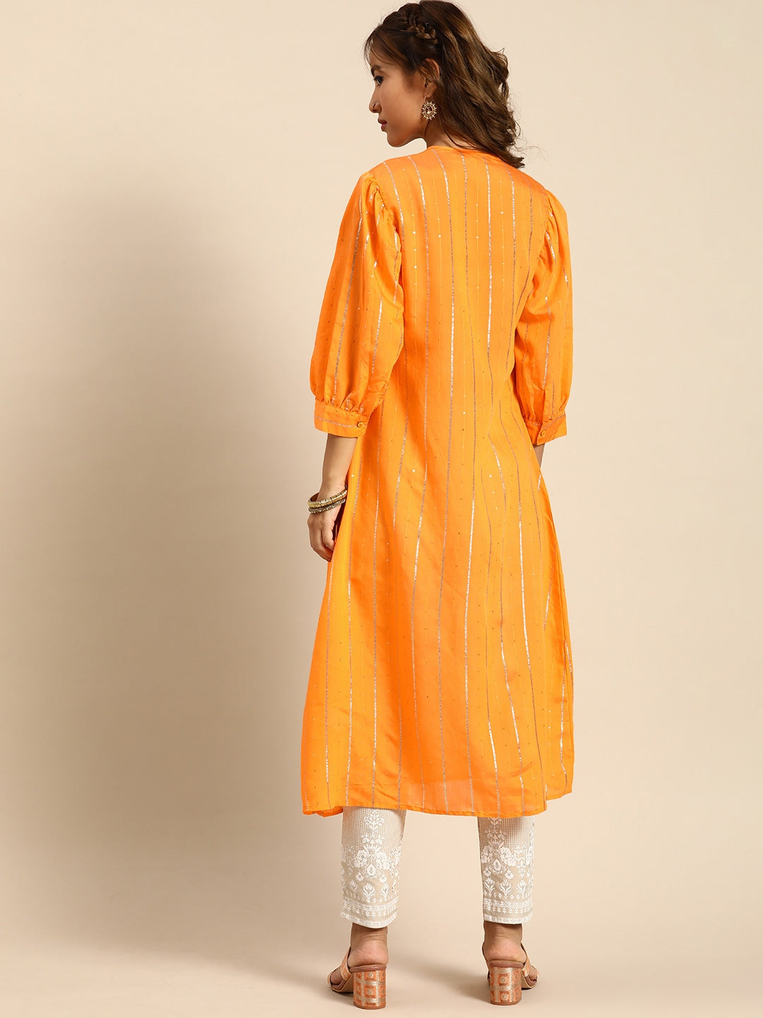 Sangria Women Jacquard Chanderi Silk Tie-Up Neck Puff Sleeves Kurta With Sequin Detail | Grocsy