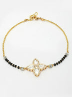 NVR Women Gold-Polished & Black Brass Stone-Studded Hand Mangalsutra Link Bracelet | Grocsy