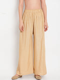 TAG 7 Women Beige Solid Flared Palazzos | Grocsy