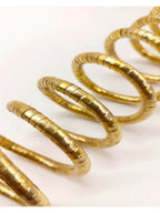 NVR Women Handmade Gold-Polished Spiral Bangle | Grocsy