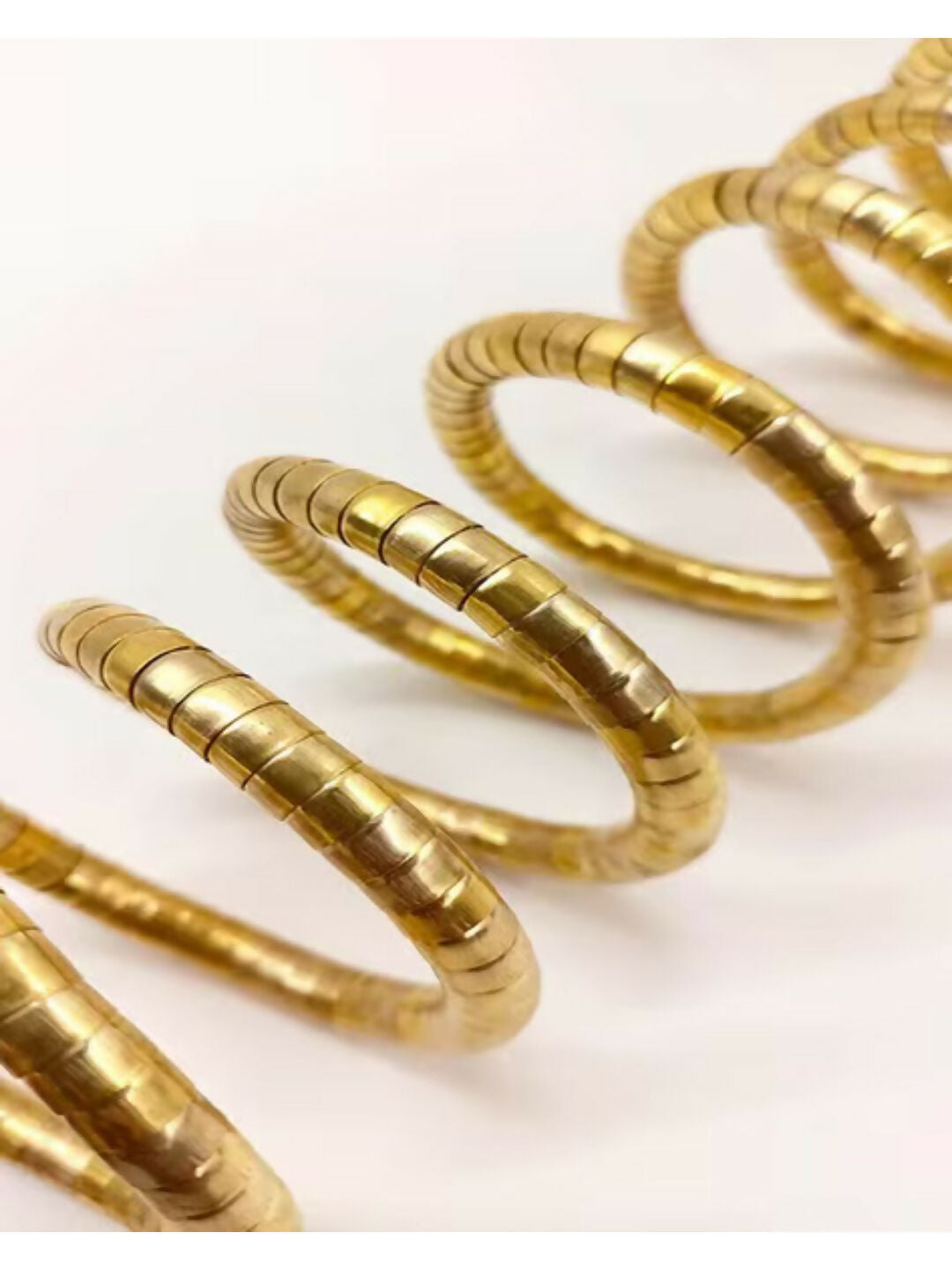 NVR Women Handmade Gold-Polished Spiral Bangle | Grocsy
