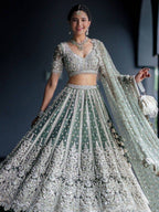 Tulsi Art Alluring Green Sequins Net Engagement Wear Lehenga Choli With Dupatta | Grocsy