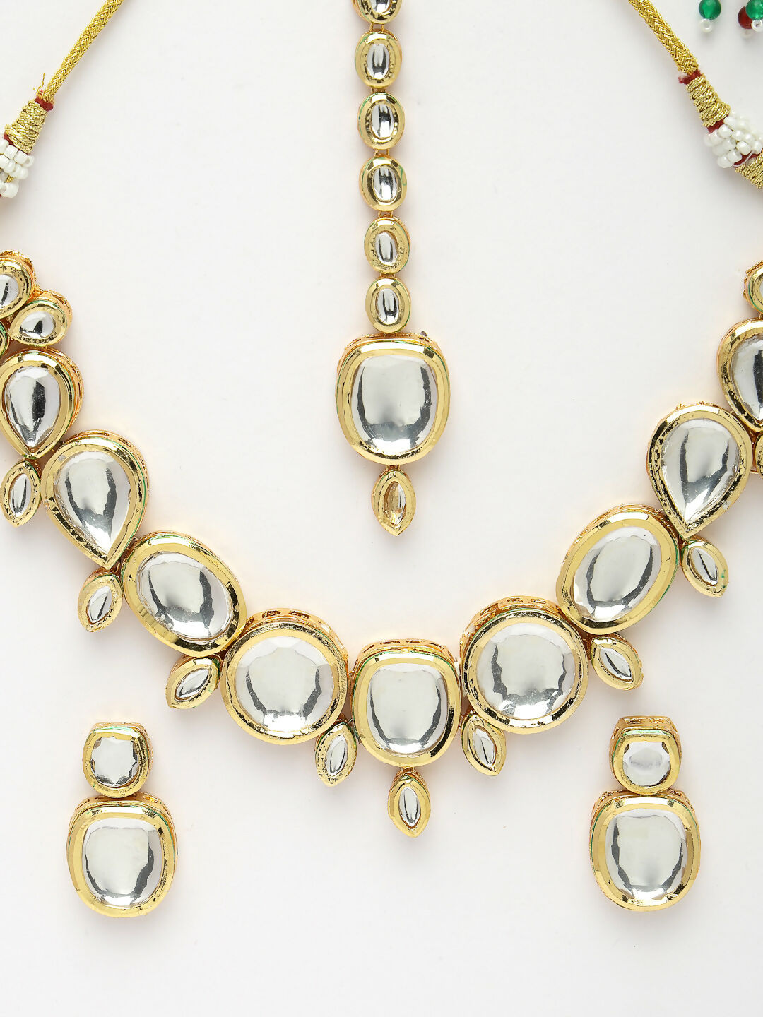 NVR Women's Gold Kundan-Studded Necklace and Earrings with Mang Tikka | Grocsy