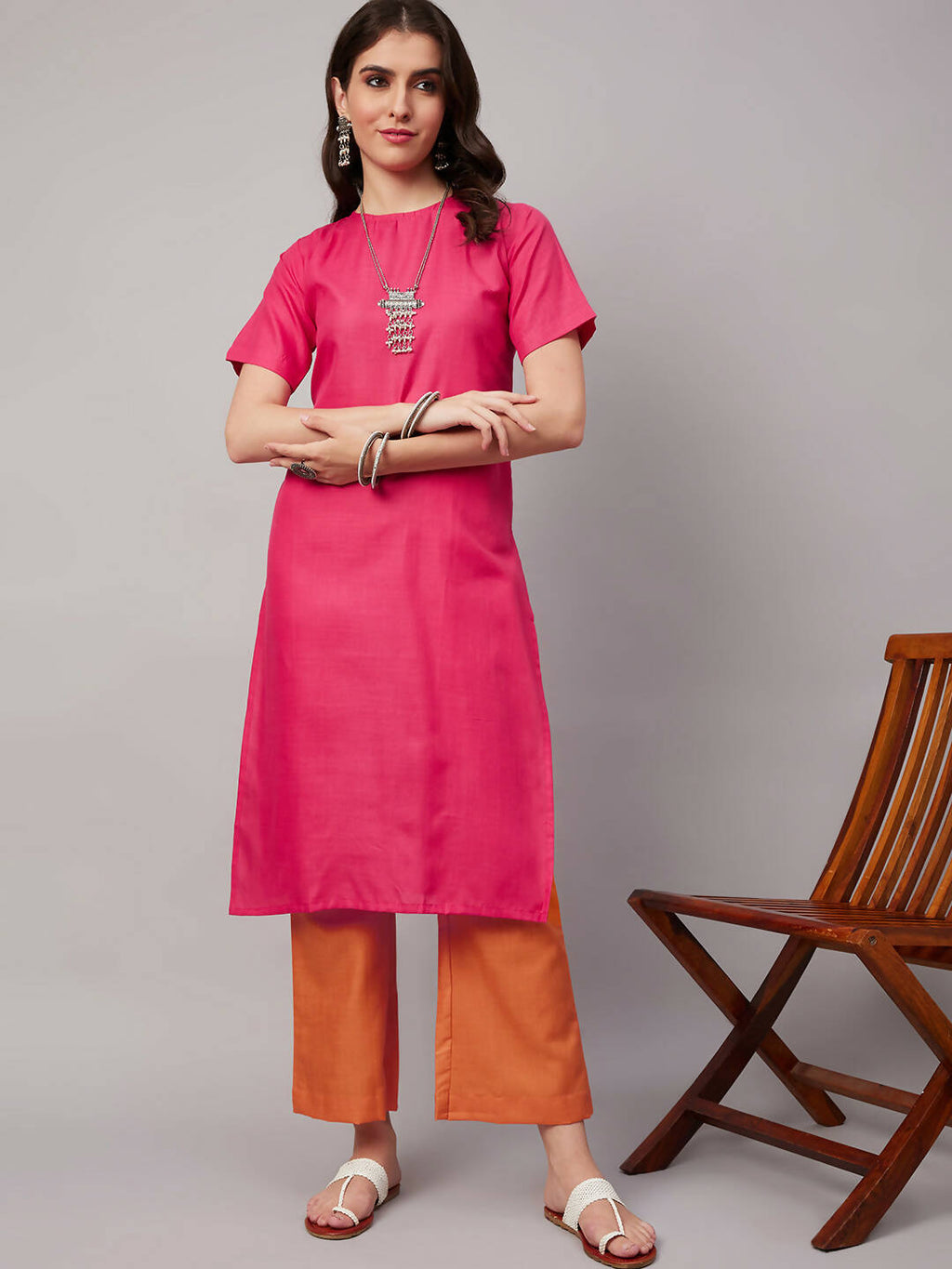 Pink Polyester solid Kurta with Palazzos - Vishwa | Grocsy