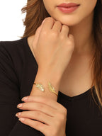 NVR Women Gold-Polished Adjustable Kada Bracelet | Grocsy