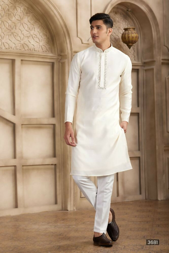 Raivat Ethnic Banarasi Art Silk Mirror Work Kurta Pajama In Cream Colour | Grocsy