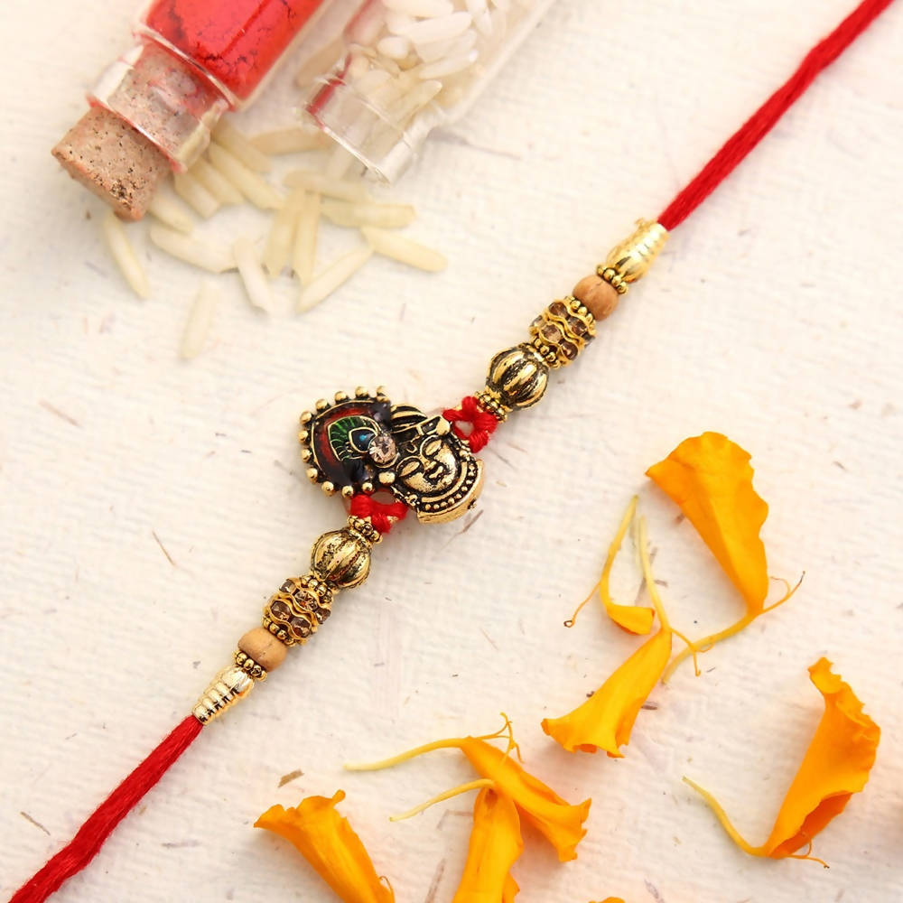 Serene Lord Krishna Rakhi & Cadbury Fruit N Nut | Grocsy