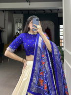 Lorenvalley Offwhite and Royalblue Tussar Silk Patola Print Lehenga Choli | Grocsy