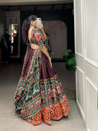 Vastranavya Navaratri Special Dola Silk Patola Print With Gamthi Work and Mirror Work Lace Border - Brown | Grocsy