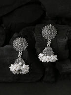 NVR Women Silver Toned Dome Shaped Jhumkas Earrings | Grocsy