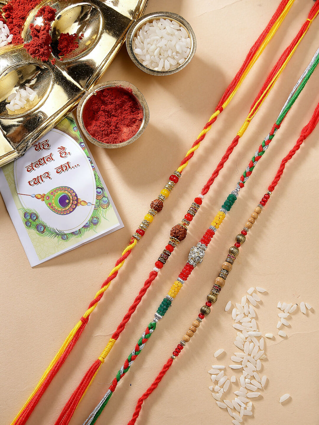 NVR Women & Men Set of 4 Multicolor Artificial stone and beads Rakhi With Roli Chawal | Grocsy