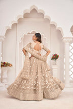 Aastha Fashion Dusty Chiku Butterfly Net White Cotton Thread Work, Zari Work And Sandwich Sequence Work Embroidery Wedding Wear Lehenga Choli | Grocsy