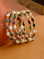 NVR Women Set of 4 Gold-Polished Artificial Stones Multicolor Bangles
