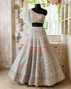 Jyoti Fashion Light Turquoise Thread, Zari and Paper Mirror Embroidered Organza One Shoulder Bridal Lehenga Choli | Grocsy