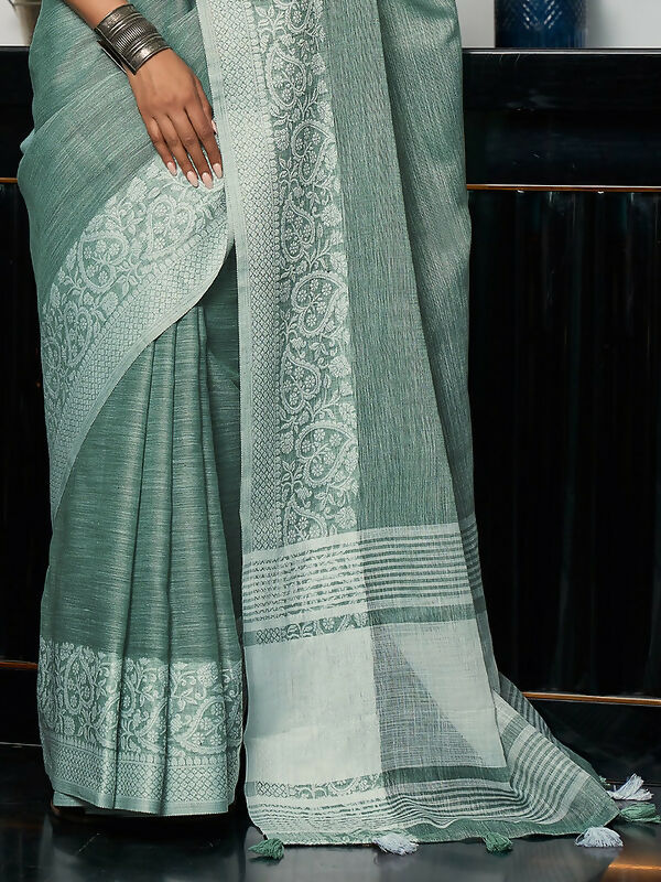 Shree Shyam Fashion Elegant Sea Green Woven Linen Saree with Contrast Zari Border & Tassels - Soft & Breathable Party Wear | Grocsy