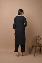 Kaajh Women's Black Solid Sequins Embellished Kurta Pant Set | Grocsy