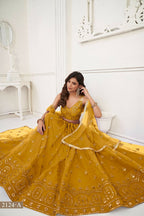 Eilara Women'S Mustard Yellow Butterfly Net With Tone Thread Work And Sandwich Embroidered Work Lehenga Choli For Wedding | Grocsy
