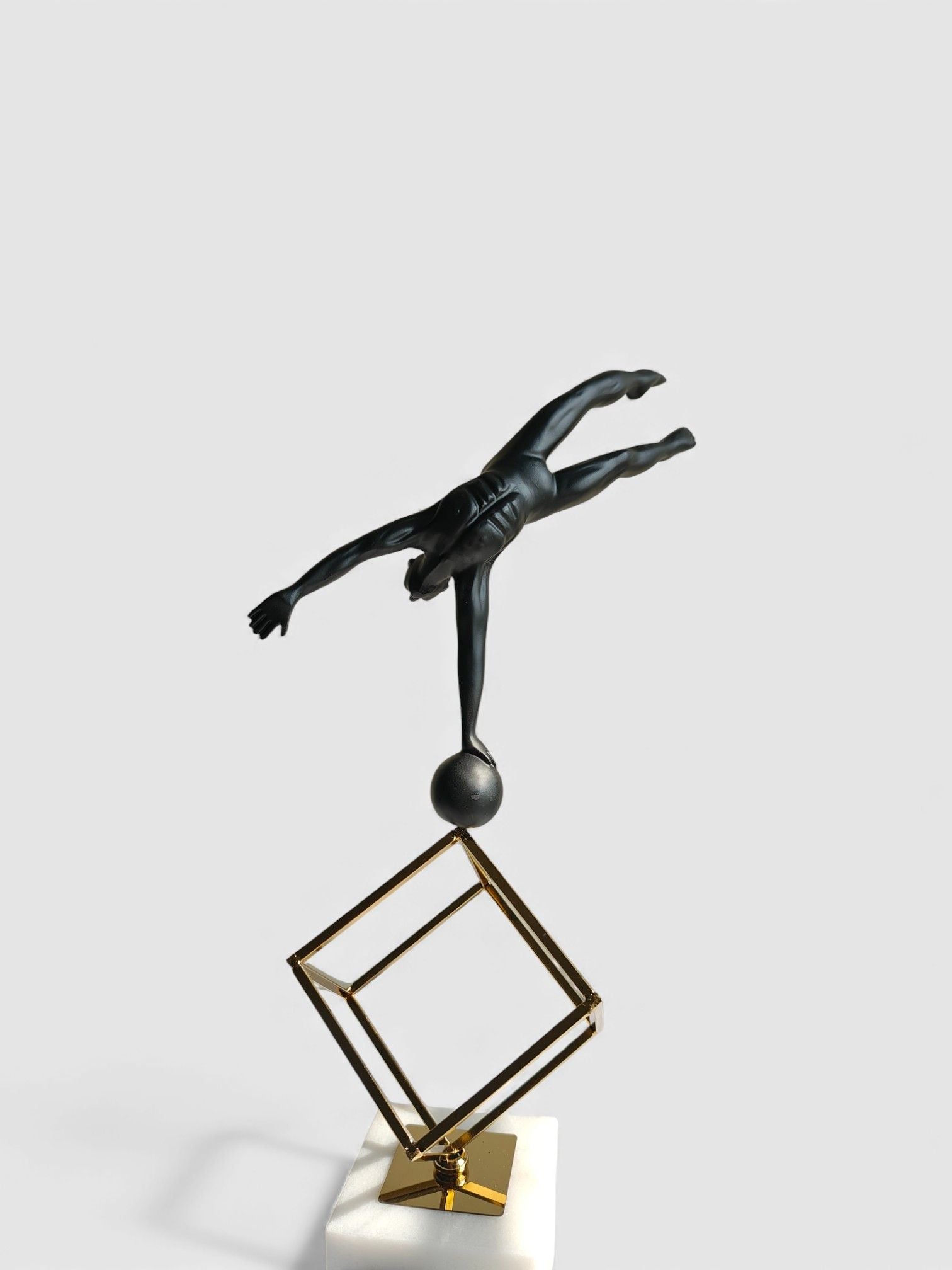 Sun Mun Decors Balancing Acrobat Sculpture | Grocsy