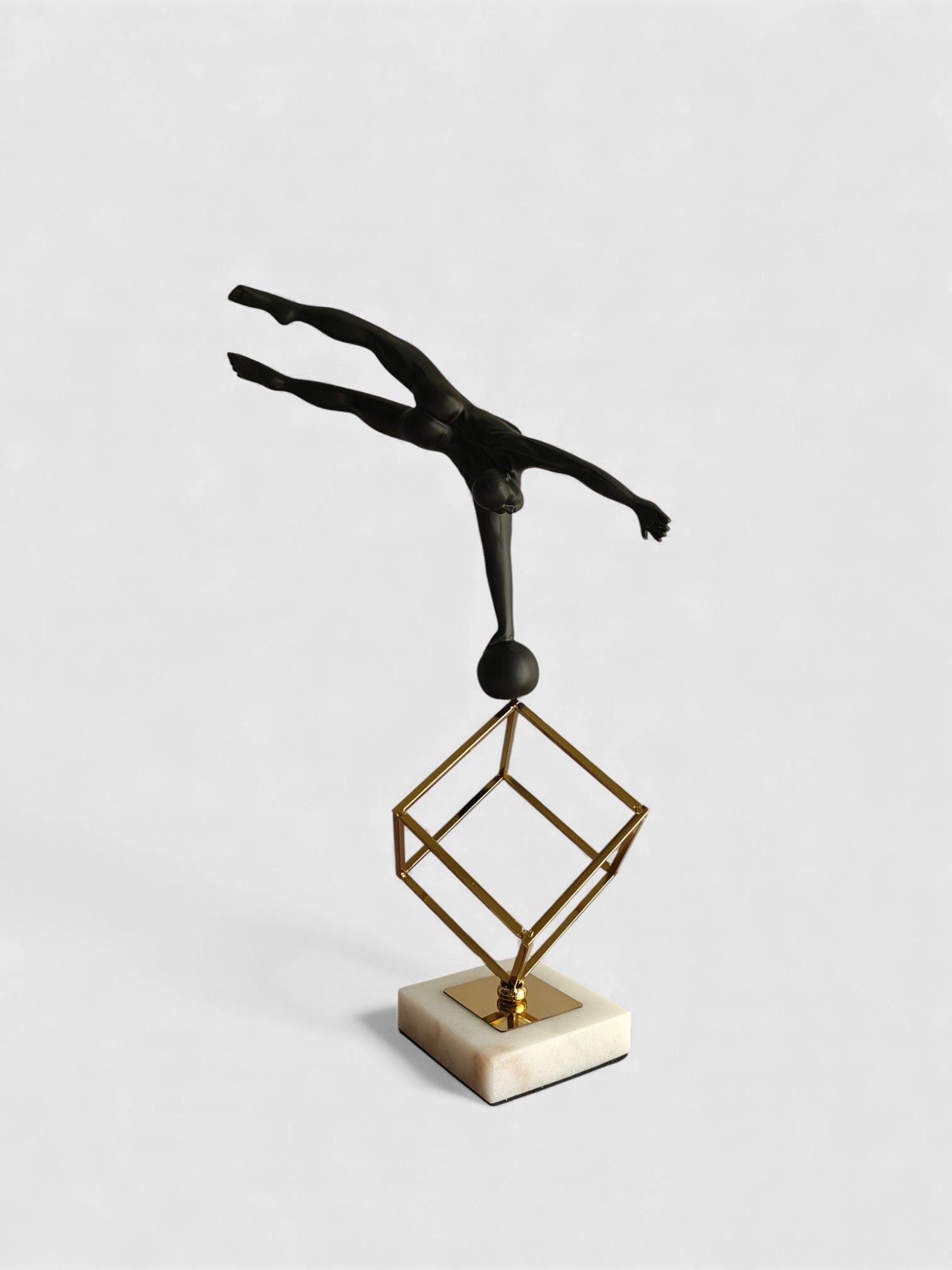 Sun Mun Decors Balancing Acrobat Sculpture | Grocsy
