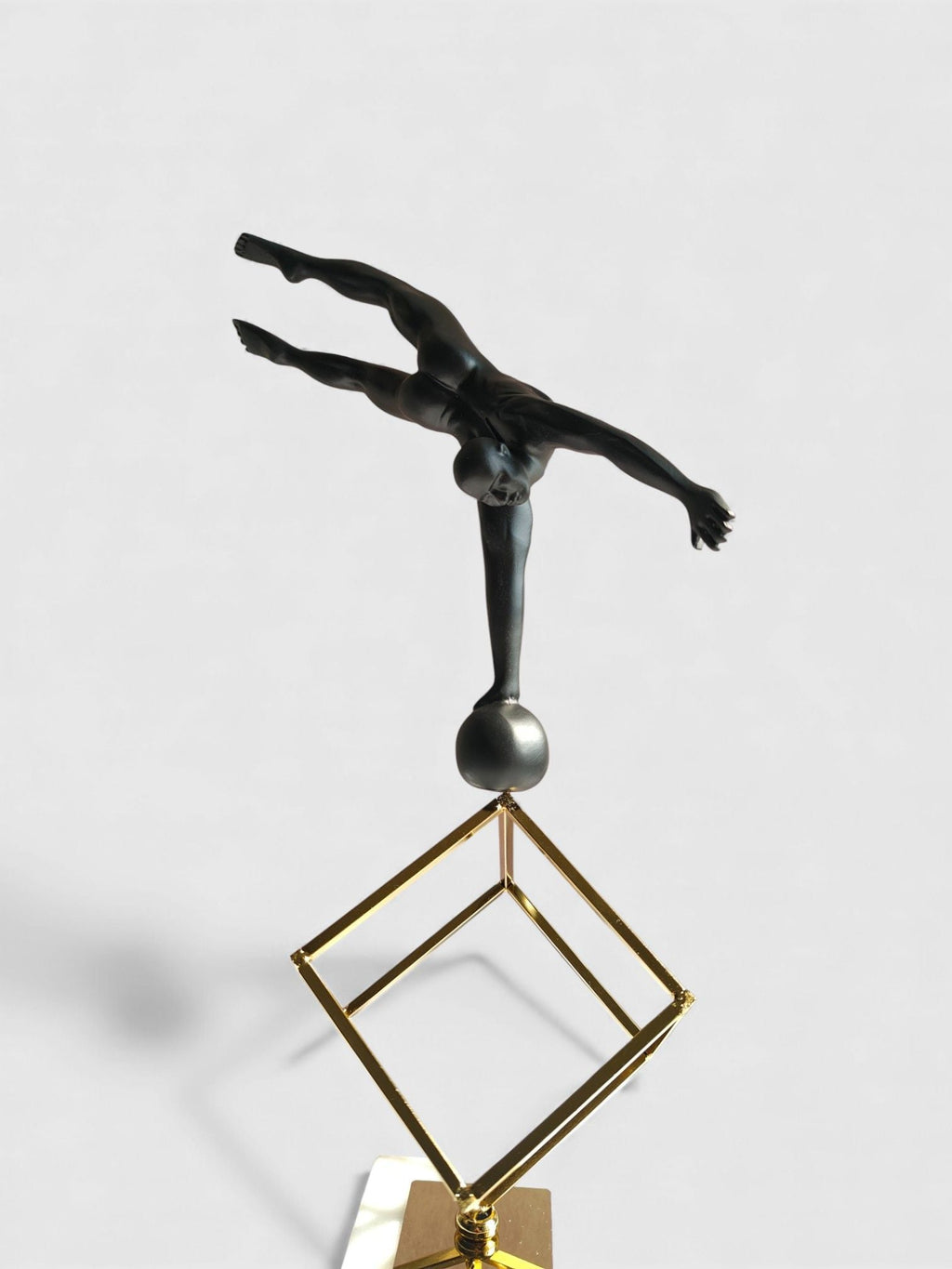 Sun Mun Decors Balancing Acrobat Sculpture | Grocsy