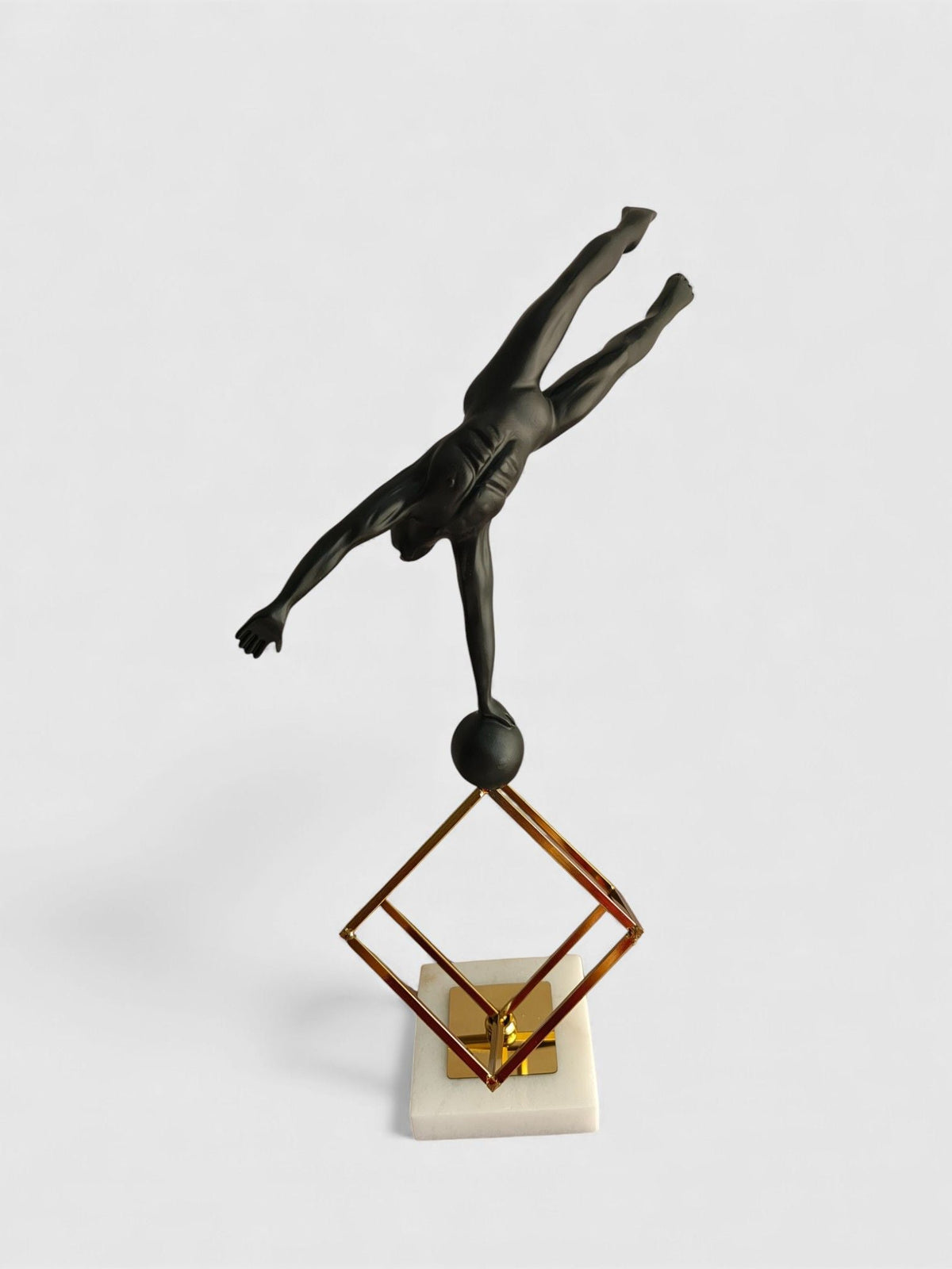 Sun Mun Decors Balancing Acrobat Sculpture | Grocsy