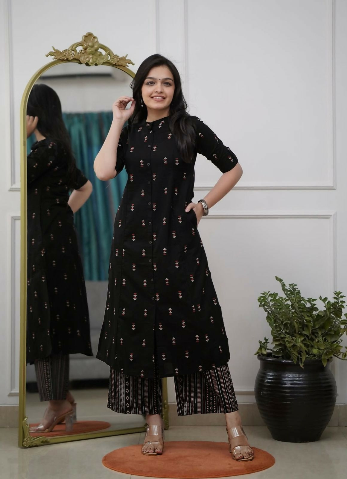 Teeya Creation Classic Black Cotton Kurta Set With Subtle Embroidery And Printed Palazzos | Grocsy