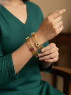 NVR Women Set of 2 Gold Plated Artificial Stone Bangle | Grocsy
