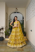 Eilara Glamorous Mustard Yellow Butterfly Net With Tone To Tone Thread And Sequence Embroidered Work Lehenga Choli For Wedding | Grocsy