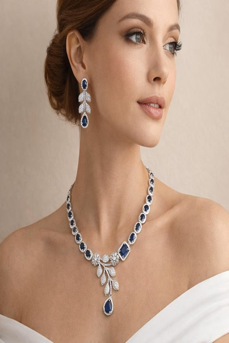 Vastrabhushan Blue Sapphire CZ Bridal Jewelry Set | Silver Plated Wedding Necklace Earrings | Grocsy