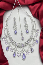 Vastrabhushan Lavender CZ Bridal Jewelry Set | Silver Tone Indian Wedding Necklace, Earrings & Maang Tikka | Grocsy