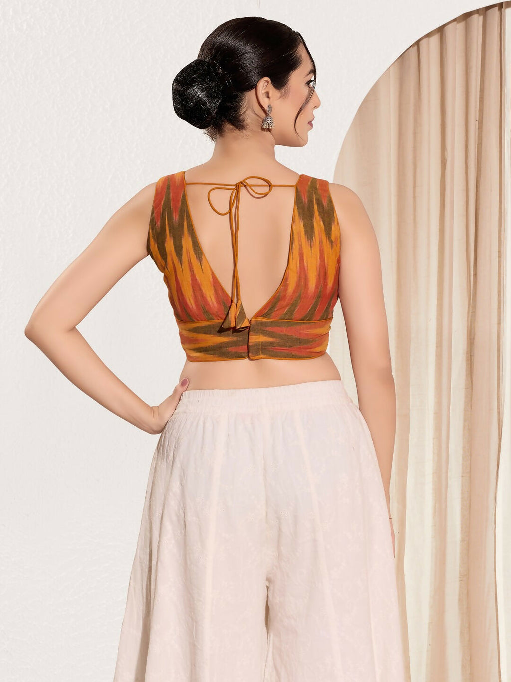 Joban Fashion Mustard Ikat Silk Padded Blouse With V Neck Sleeveless | Grocsy