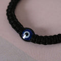 NVR Men & Women Black Fabric Elasticated Bracelet | Grocsy