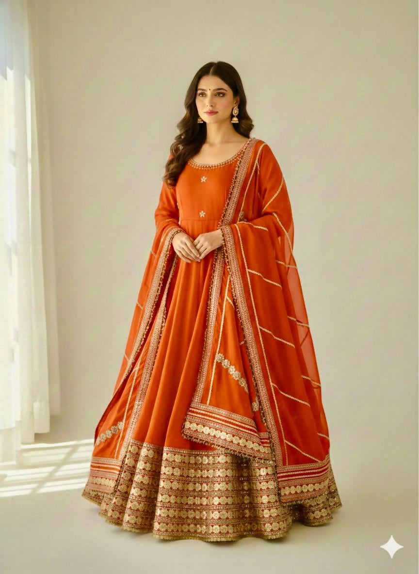 Teeya Creation Womens New Fancy Silk Heavy Quality Fabric With Handwork Orange Gown Set | Grocsy