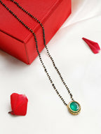 Gold-Polished Black Beaded Green Kundan Studded Handcrafted Mangalsutra - Ruby Raang | Grocsy