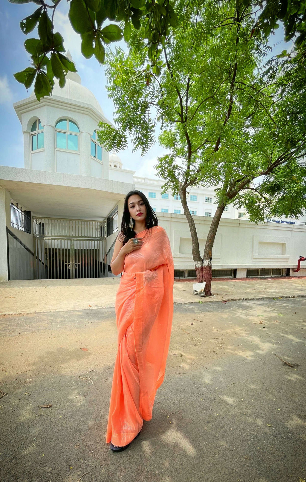 Vamsee Solid Color Sea Orange Georgette Saree | Grocsy