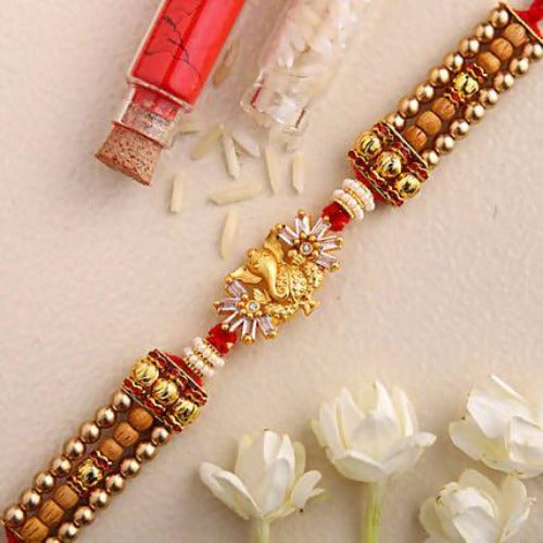 Ganesha Design Rakhi and Kaju Katli Box | Grocsy