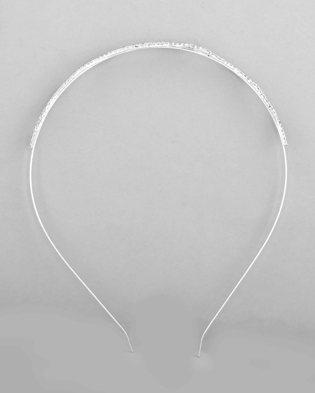 VOJ Silver Plated AD Studded Wave Shaped Hairband | Grocsy