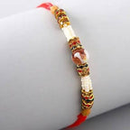 Striking Pearl Rakhi | Grocsy