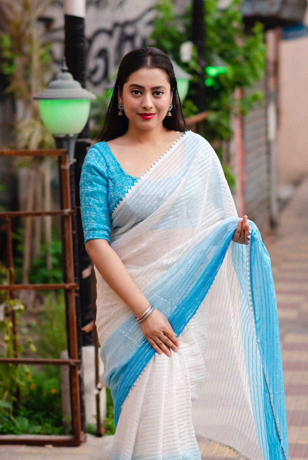 Blue Poly Chiffon Striped Saree with Unstitched Blouse - Hiral Fashion | Grocsy