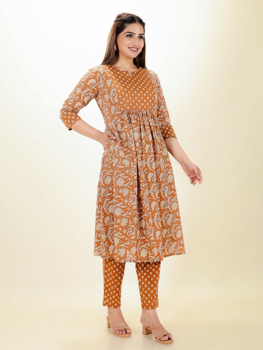 Aramya Orange Soft Cotton Floral Print Panelled Kurta Set for Women | Grocsy