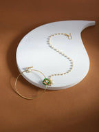 Gold-Polished Green White Kundan Studded Beaded Chained Nosepin - Ruby Raang | Grocsy