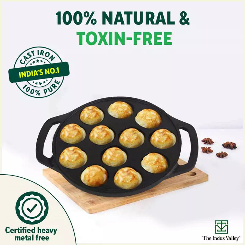 The Indus Valley 12 Pit/Cup CASTrong Cast Iron Kuzhi Paniyaram/Paddu Pan/Appe Maker, Pre-seasoned, 100% Pure, Toxin-free, Spatula, 21 cm, 2.2 kg | Grocsy