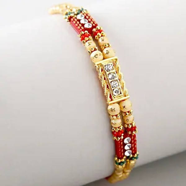 Dainty Kundan Rakhi And Kaju Rolls Box | Grocsy