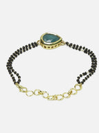 Women's Black Gold-Toned Gold-Polished Kundan Studded Charm Mangalsutra Bracelet - Ruby Raang | Grocsy