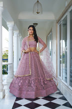 Eilara Glamorous Dusty Pink Butterfly Net With Tone To Tone Thread And Sequence Embroidered Work Lehenga Choli For Wedding | Grocsy