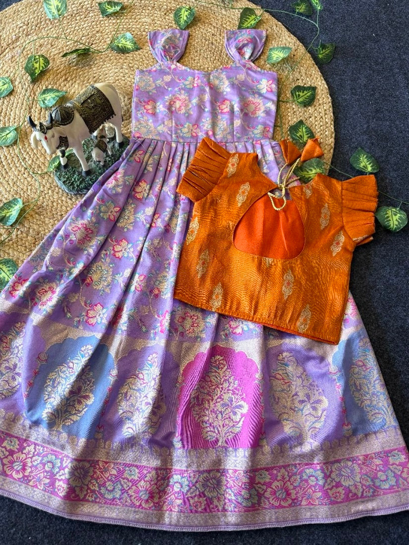 Evanik Festive Wear Lavender Dola Silk zari and thread weaving Gown With Orange Koti | Grocsy
