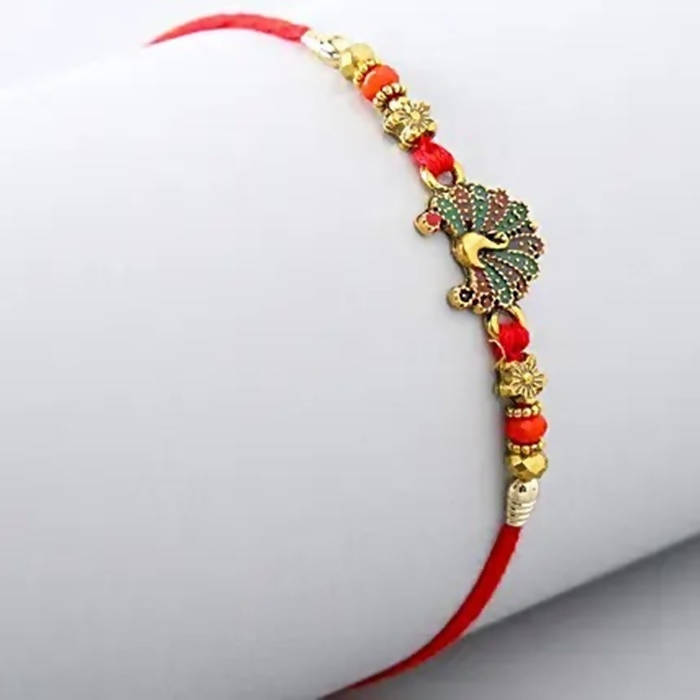 Beautiful Peacock Ethnic Rakhi & Cadbury Temptations | Grocsy